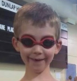 Graham Mahoney wearing swim goggles at the pool