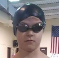 Jack Mahoney in a swim cap and goggles at the pool